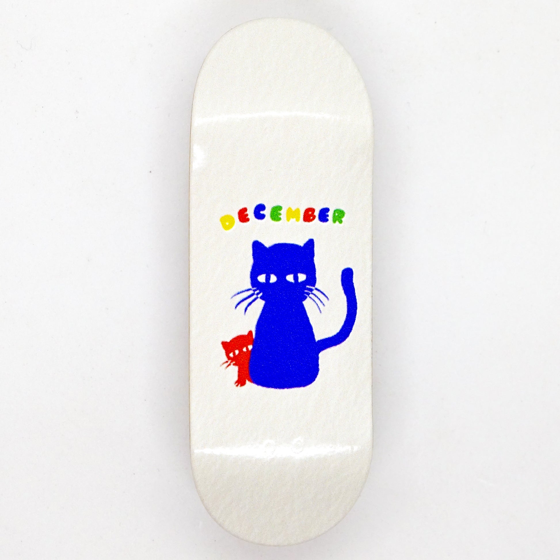 December Real Wear - Catz Vertical - December Fingerboards